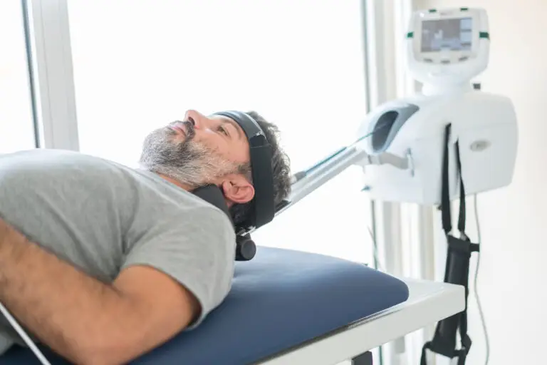 A patient undergoing spinal traction therapy for the neck.